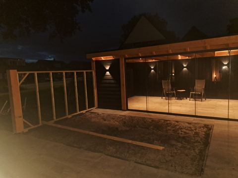 De veranda wordt gebruikt als buitenkamer